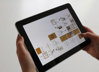 An Honest Review of the Huawei Mediapad m3 Lite 10 Person using a black tablet